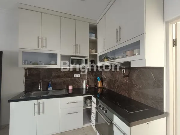 image RUMAH MINIMALIS MODERN DENGAN TAMAN YANG LUAS DI RENON (5)