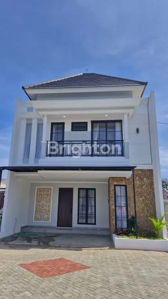 image RUMAH 2 LANTAI DESIGN BALI TROPICAL DENGAN LOKASI YANG STRATEGIS DAN ASRI DI DEPOK (1)