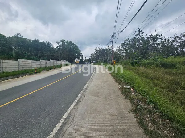 image TANAH DI KM 22 LOKASI STRATEGIS DI PINGGIR JALAN BESAR (2)