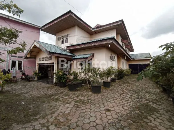 image RUMAH BULATAN TEPI JALAN ASPAL (1)