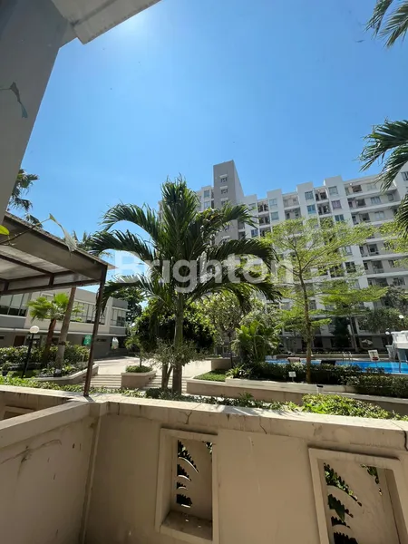 image APARTEMEN MURAH 2BR EAST COAST RESIDENCE PAKUWON CITY ADA BALKON DAN VIEW KOLAM RENANG (4)