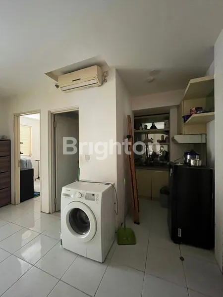 image APARTEMEN MURAH 2BR EAST COAST RESIDENCE PAKUWON CITY ADA BALKON DAN VIEW KOLAM RENANG (5)