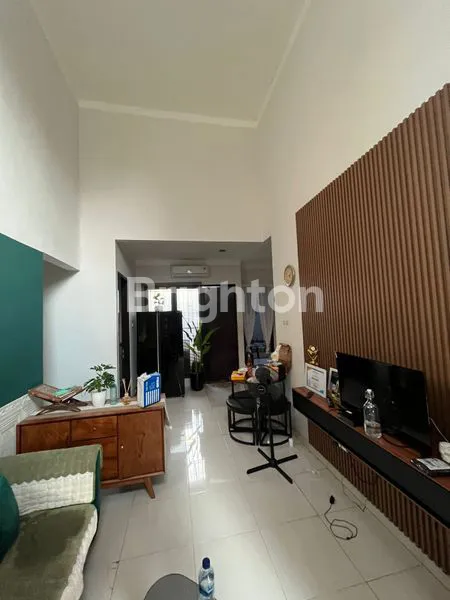 RUMAH SIAP HUNI DALAM CLUSTER GRAHA RAYA