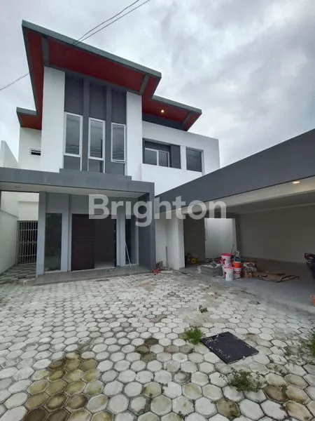 image RUMAH BARU KUTISARI INDAH JALAN KEMBAR SIAP HUNI DEKAT KAMPUS PETRA (1)