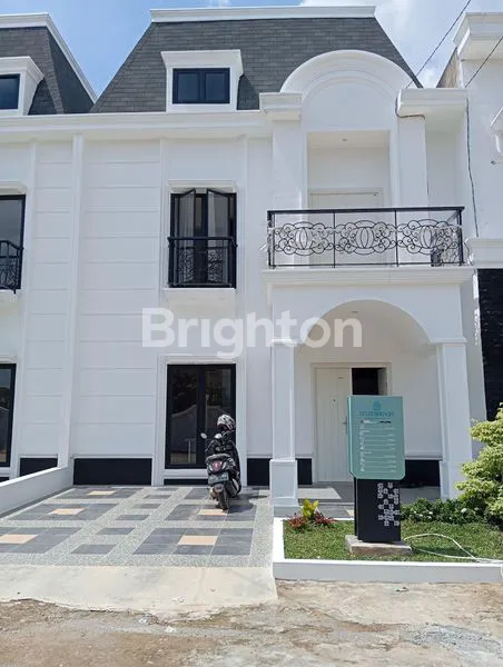 image PERUMAHAN BERGAYA ARSITEKTUR AMERIKA CLASSIK DI PALEMBANG (1)