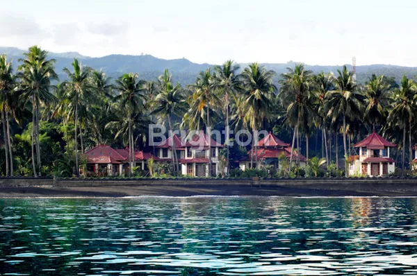 BEACHFRONT VILLA OR BUNGALOW WITH LARGE BLACK SAND BEACH DESIGNED ECO-FRIENDLY IN NORTH BALI