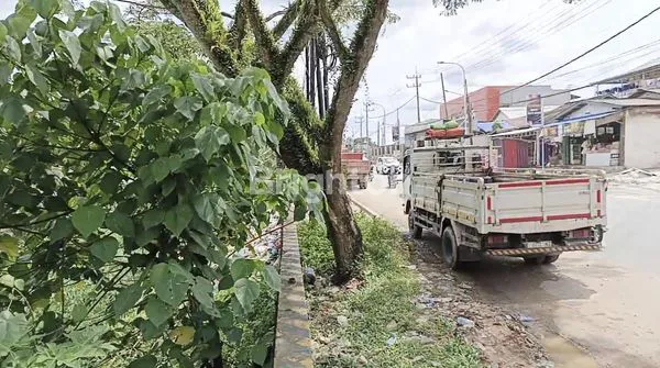 image TANAH PINGGIR JALAN POROS KILO 15 (1)