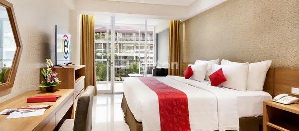 image UNIT CONDOTEL RAMADA ENCORE SEMINYAK BALCONY & POOL VIEW (1)