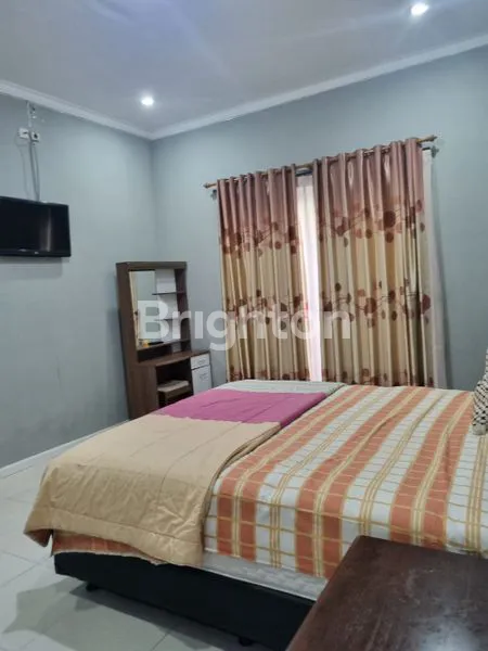 image DIJUAL RUMAH BESAR DAN MEWAH DENGAN KOLAM RENANG SEMIFURNISH LOKASI DALAM PERUMAHAN WIKA AMAN NYAMAN HARGA NEGO (5)
