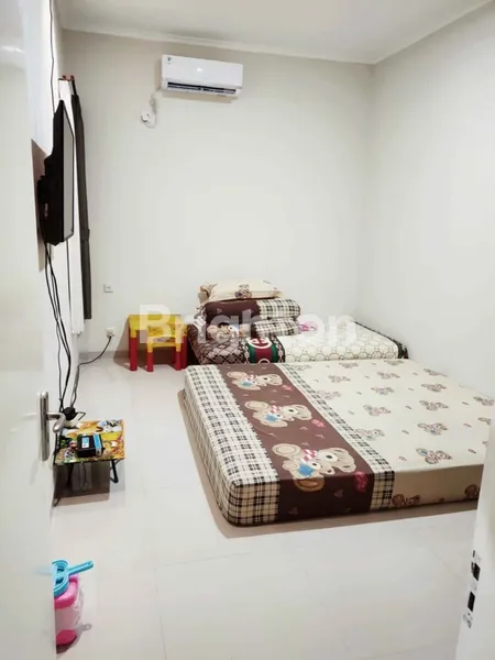 image RUMAH SIAP HUNI HARGA 1M DEKAT TOL TAMBAK SUMUR LOKASI DI CLUSTER SEMANGKA  (5)