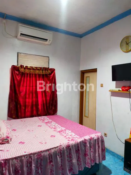 image RUMAH DENGAN HALAMAN LUAS DEKAT TOL KAYUMANIS (5)