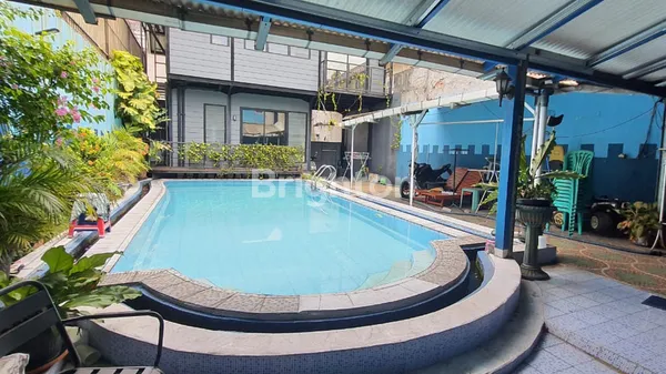 image DIJUAL TURUN HARGA RUMAH 2 KAVLING DENGAN SWIMMING POOL DI TAMAN LAGUNA CIBUBUR (1)