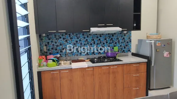 image DIJUAL TURUN HARGA RUMAH 2 KAVLING DENGAN SWIMMING POOL DI TAMAN LAGUNA CIBUBUR (6)