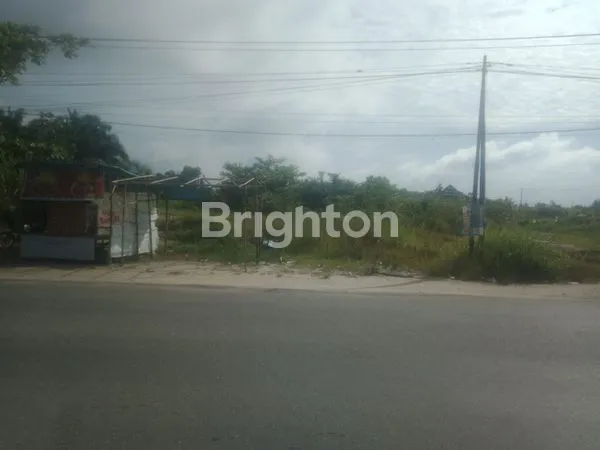 image TANAH POSISI  DI PINGGIR JALAN.DEKAT SPBU (4)