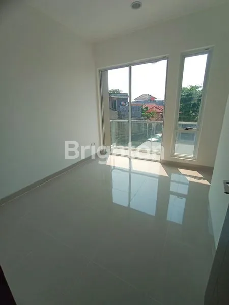 image RUMAH CLUSTER MINIMALIS 2 LANTAI (4)