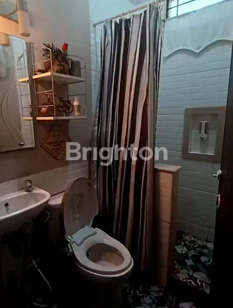 image DIKONTRAKKAN RUMAH CANTIK JL. PURWODADI PANAM (5)