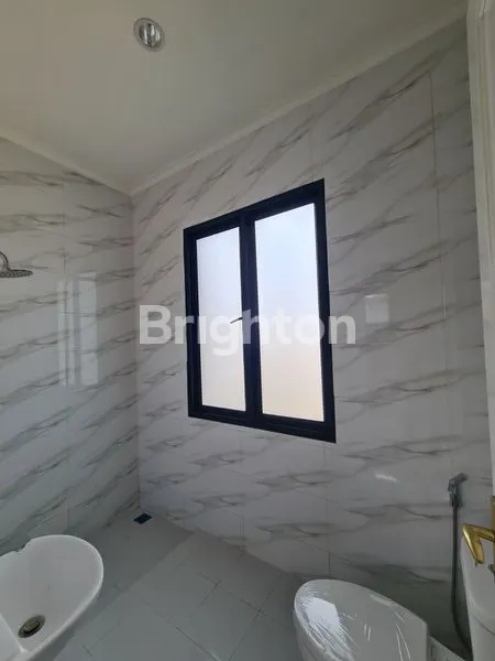 image RUMAH CANTIK SIAP HUNI DALAM CLUSTER KOTA WISATA DI AREA KOMERSIAL KOTA WISATA CIBUBUR (3)