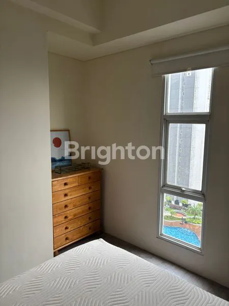 image APARTEMEN 2BR CORNER FULL FURNISHED VIEW POOL AKASA PURE LIVING (5)