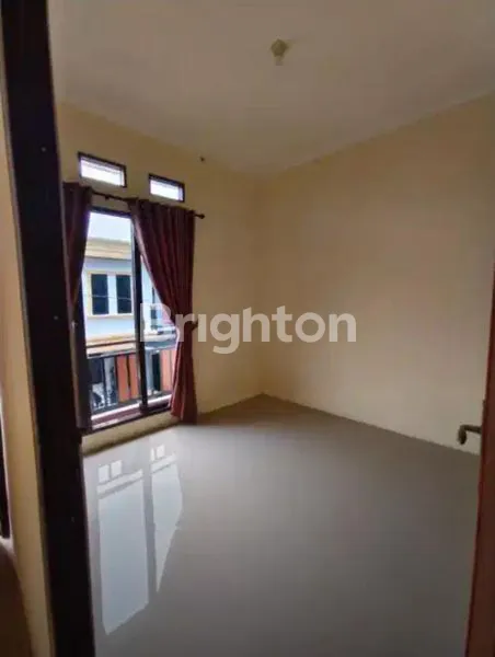 image RUMAH 2LT DEKAT GRAHA RAYA (3)