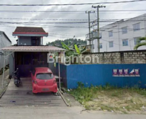 image DIJUAL TANAH DAN BANGUNAN DI PINGGIR JALAN SAMARINDA (2)