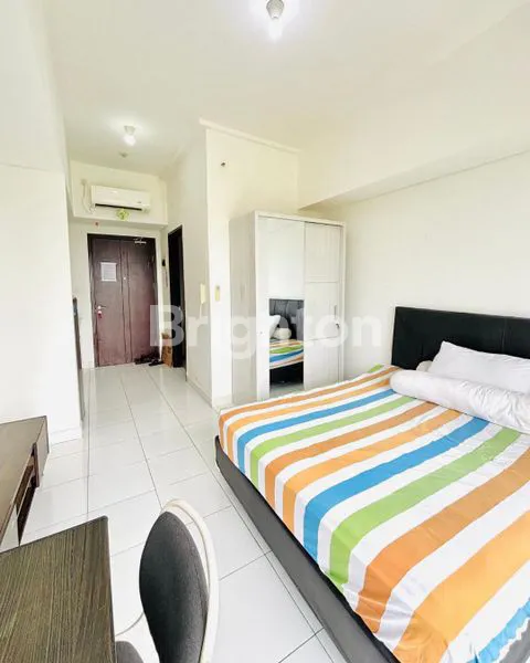 image JUAL CEPAT APARTEMEN CASA DE PARCO STUDIO FURNISH HADAP TIMUR DENGAN BALKON DI LANTAI 12, BSD (3)