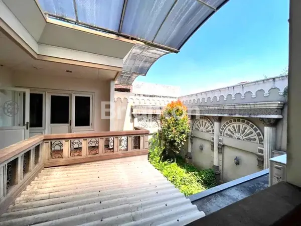 image RUMAH MEWAH DI DHARMAHUSADA INDAH ROW JALAN 3 MOBIL (4)