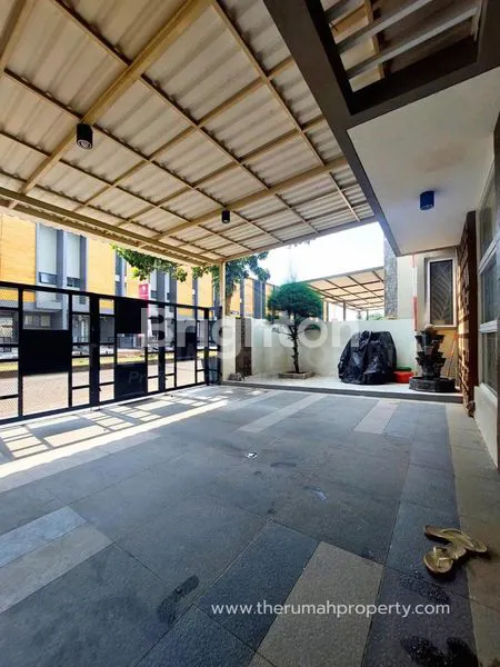 image RUMAH MEWAH 2 LANTAI GRAND WISATA - 4KT, SEMI FURNISHED, SHM (2)