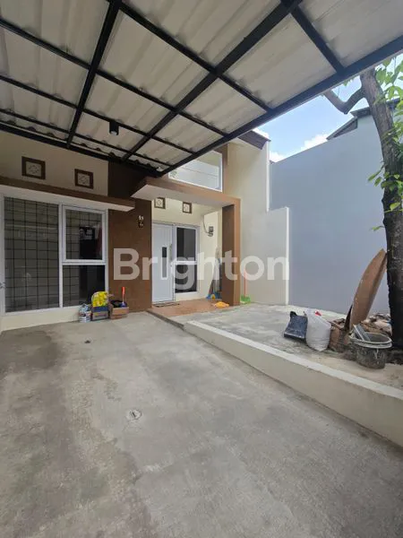 image RUMAH MINIMALIS MODERN DI KOMPLEK DHAYA PESONA JOMBANG (1)