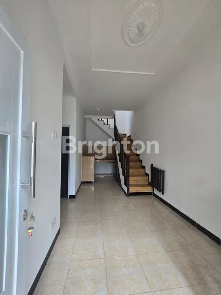 image RUMAH MINIMALIS MODERN DI KOMPLEK DHAYA PESONA JOMBANG (2)