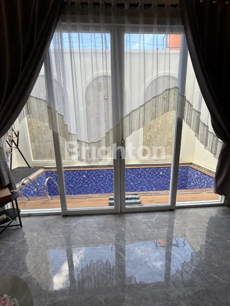 image RUMAH MEWAH 2 LANTAI + KOLAM RENANG DI VILLA KEDAMAIAN ASRI (7)