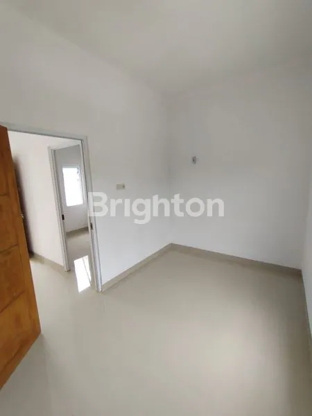 image RUMAH KUALITAS UNIK DI JUAL SIAP HUNI DI TAPOS DEPOK, 10-15 MENIT KE STASIUN TAPOS/DEPOK BARU, 5-10 MENIT KE PASAR TRADISIONAL, MINIMARKET, DAN PUSAT BELANJA (6)