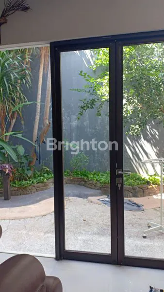 image RUMAH 2ND TERAWAT DHARMAHUSADA MAS DALAM KOMPLEK ONE GATE, DEKAT LAPANGAN TENIS, SEMI FURNISHED HADAP UTARA BISA KPR (5)