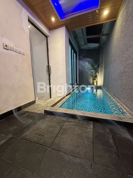 image RUMAH MINIMALIS DENGAN KOLAM RENANG DI GREEN RESIDENCE BUDURAN (5)