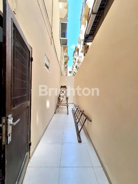 image LOKASI EMAS !! RUKO GANDENG JL. PANCING / WILLIEM ISKANDAR. KONDISI BARU, SIAP HUNI.  (3)