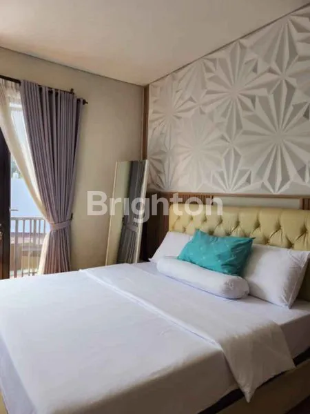 image RUMAH SEMI VILLA  ONE GATE SYSTEM DENGAN KOLAM RENANG DI PURI GADING JIMBARAN (7)