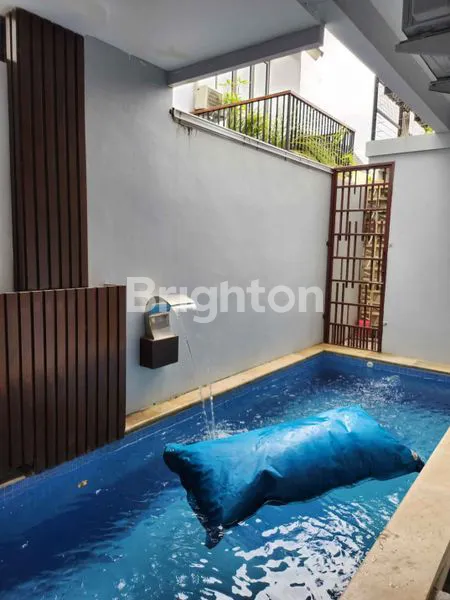 image RUMAH SEMI VILLA  ONE GATE SYSTEM DENGAN KOLAM RENANG DI PURI GADING JIMBARAN (8)