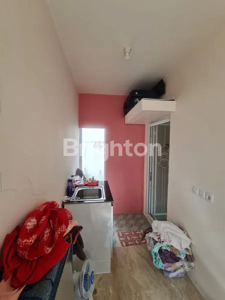 image RUMAH MINIMALIS POSISI HOOK HADAP SELATAN CLUSTER TESLA GADING SERPONG (7)