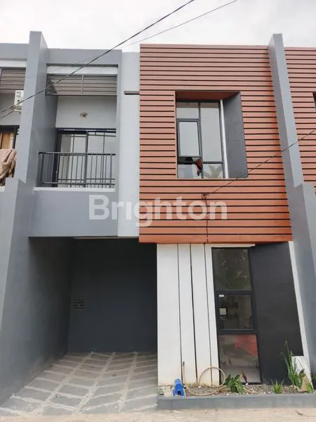 RUMAH BARU TOWNHOUSE 2 LANTAI SIAP HUNI AREA RAWASARI CELENTANG DEKAT PASAR SAKO