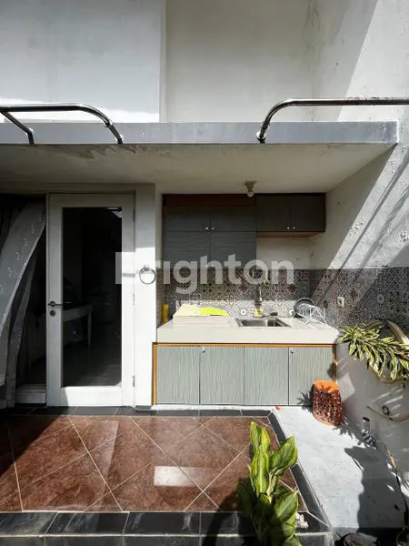 image HUNIAN NYAMAN CLUSTER FRONT VIEW RANCAMAYA GOLF ESTATE (7)