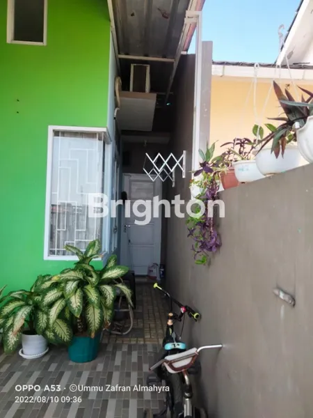 image RUMAH CANTIK DALAM PERUMAHAN DI TARUMAJAYA KAB BEKASI (6)