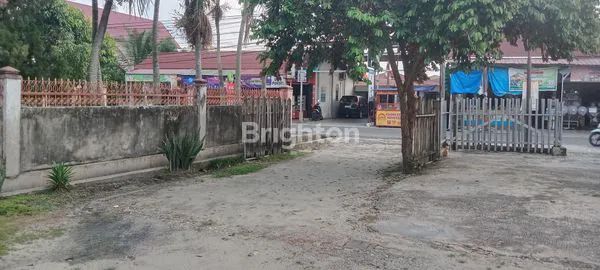 image TANAH KOMERSIAL BESERTA ISI BANGUNAN 1.316M2 DI JL. KERETA API (3)