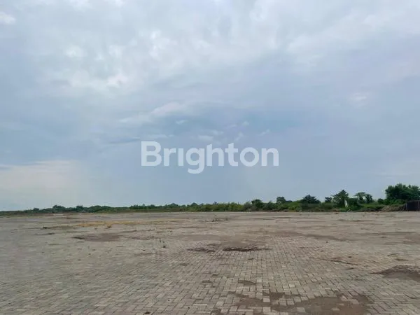 image LAHAN PAVING 1,6 HA DI TAMBAK OSOWILANGUN, DEKAT PELABUHAN TELUK LAMONG — COCOK UNTUK DEPO & STOCKPILE, BOLEH SEWA SEBAGIAN DAN BULANAN (1)