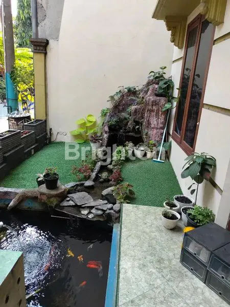 image RUMAH JAMBANGAN TAMA ADA KOLAM IKAN DAN AIR TERJUN (3)