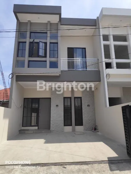 image RUMAH MINIMALIS 2 LANTAI DI WISMA MUKTI (1)