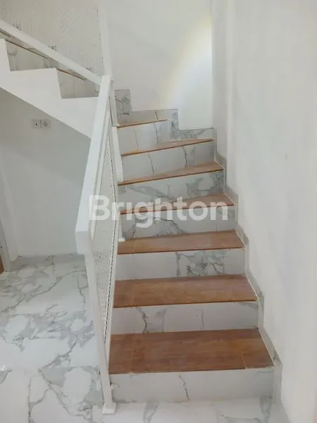 image RUMAH BARU MURAH DALAM CLUSTER DI TANAH BARU BEJI DEPOK (4)