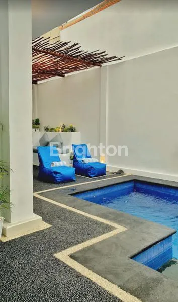 image VILLA 1 LANTAI SEMI FURNISHED DENGAN SWIMMING POOL DILINGKUNGAN YANG TENANG DAN NYAMAN LOKASI STRATEGIS (2)