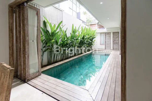 image RUMAH SEMI VILLA FULL FURNISHED 2 LANTAI DI SEMINYAK (1)