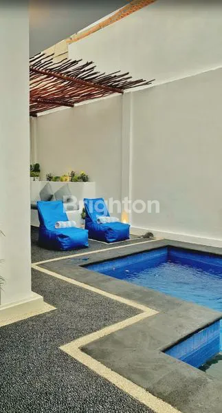 image FOR RENT – CHARMING SEMI-FURNISHED 2-BEDROOM VILLA IN JALAN DEWI SRI KUTA  (2)