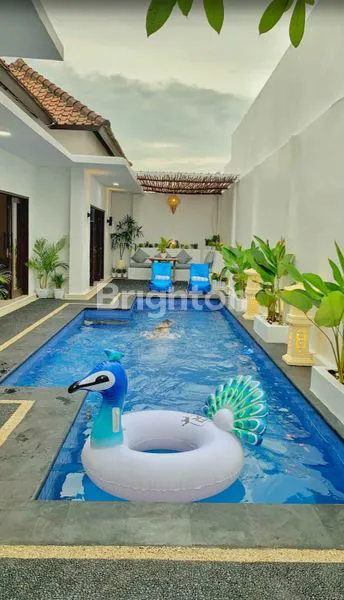 image FOR RENT – CHARMING SEMI-FURNISHED 2-BEDROOM VILLA IN JALAN DEWI SRI KUTA  (1)