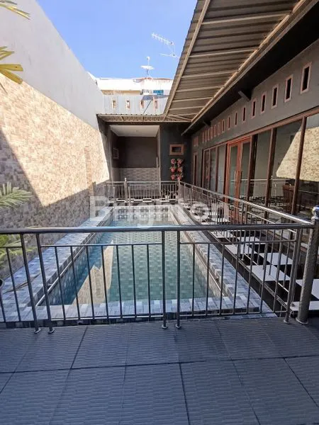 image RUMAH MEWAH FULL FURNISHED INI MEMILIKI KOLAM RENANG PRIBADI BERADA DI KAWASAN PERUMAHAN STELLA RAYA SIMPANG SELAYANG MEDAN TUNTUNGAN (7)